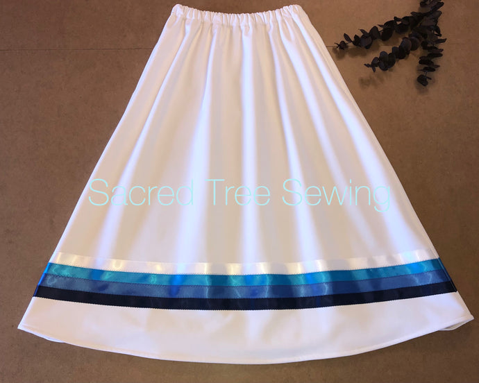 White rain skirt with navy, royal, teal and white colored ribbons