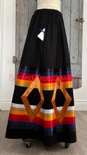 Load image into Gallery viewer, Seven golden diamonds adorn red, orange, gold, navy and black ribbons on a black skirt, pocket view
